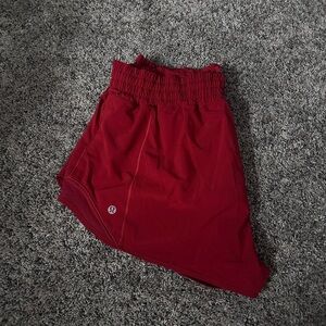 lululemon high rise hotty hot shorts 
2.5in inseam
color: red 
size: 12